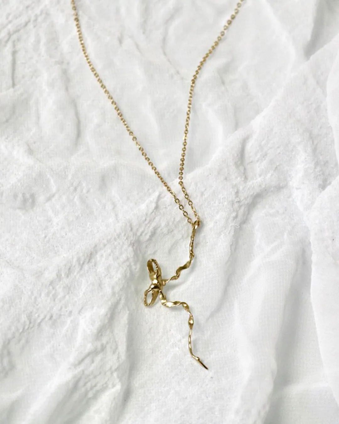 Burnt Bow Pendant - Gold