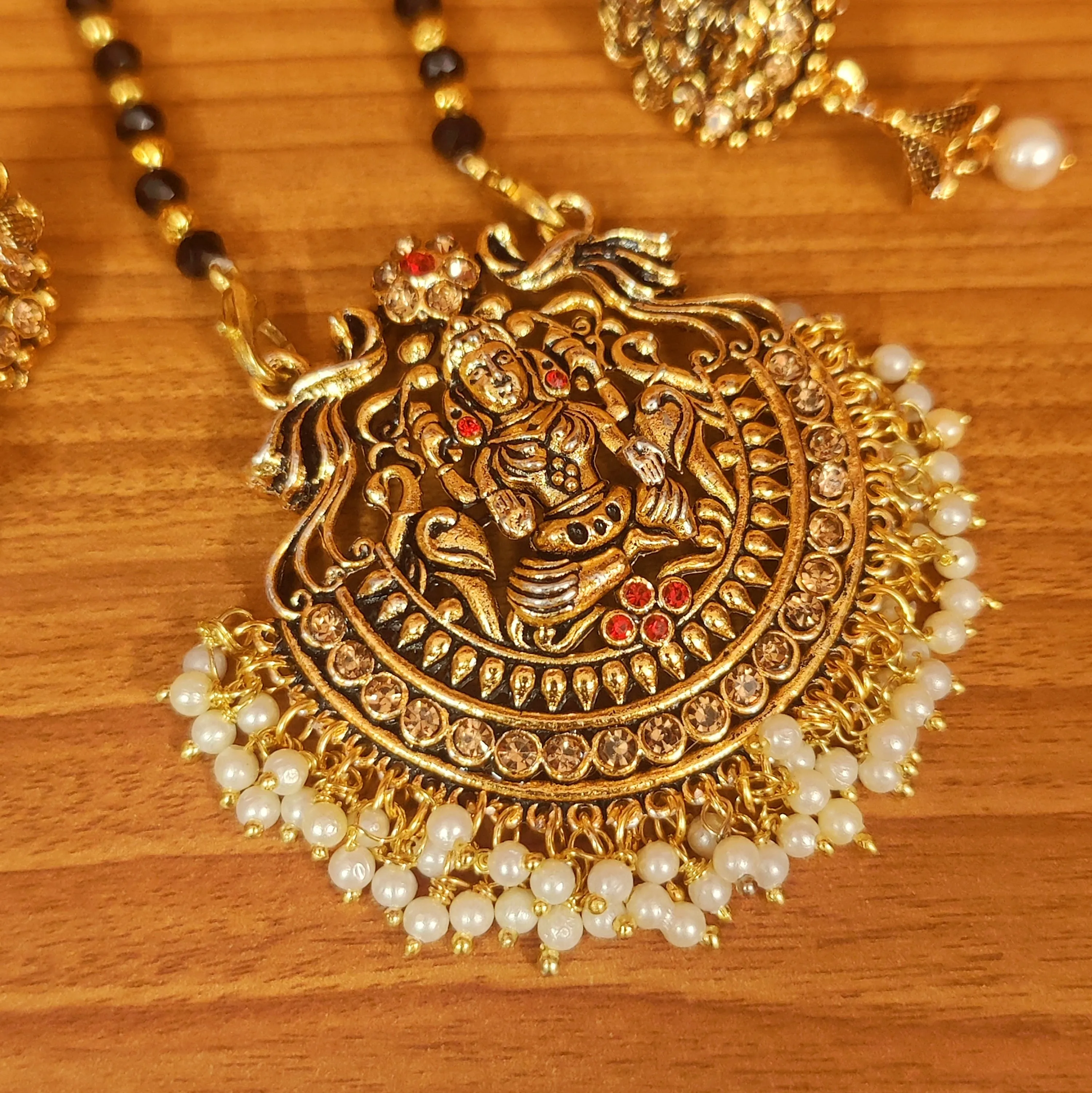 TEMPLE LOOK ZIRCON STUDDED BLACK PENDANT SET