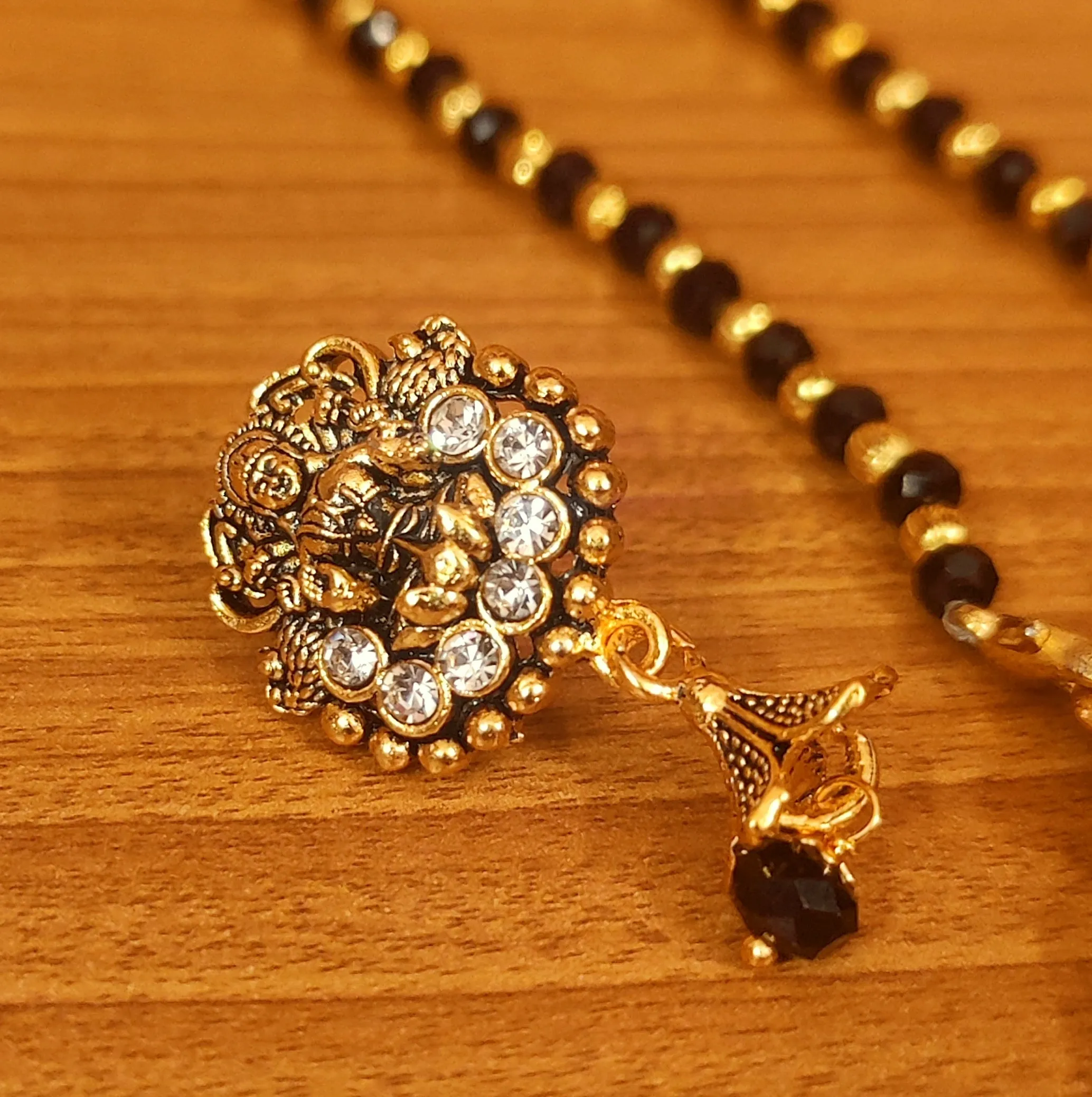 TEMPLE LOOK ZIRCON STUDDED BLACK PENDANT SET